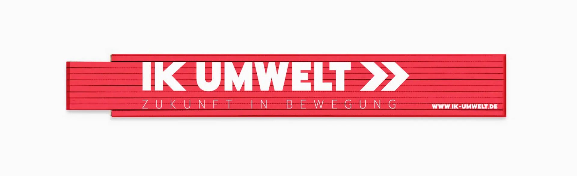 Zollstock mit IK Umwelt Logo